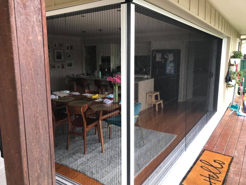 Intelliscreens Pillar-less Corner Doors provide unobstructed views of the outdoors
