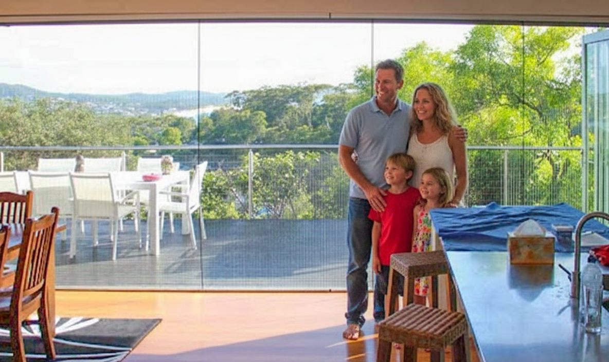 Happy family enjoying fly screens with their french doors